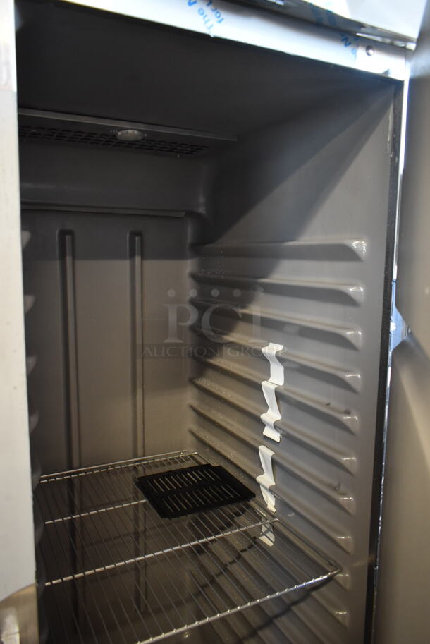 BRAND NEW SCRATCH AND DENT! 2023 Delfield 6125XL-S Stainless Steel Commercial Single Door Reach In Freezer on Commercial Casters. 115 Volts, 1 Phase. Tested and Does Not Power On - Image 6 of 8
