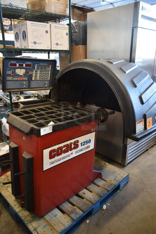 Coats 1250 Metal Commercial Floor Style 2D Wheel Balancer with Laser Guided Operation. 220-250 Volts, 1 Phase.
