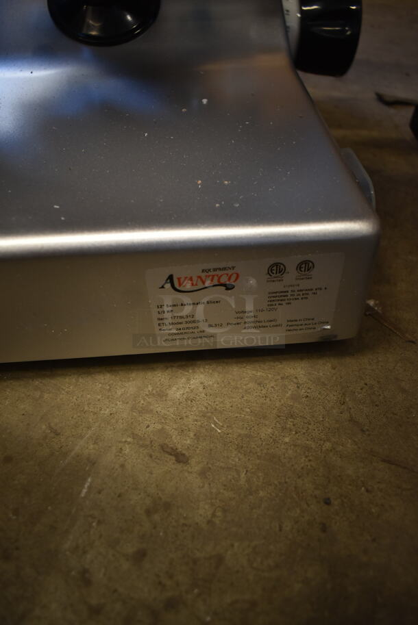 BRAND NEW SCRATCH AND DENT! Avantco 177SL312 Stainless Steel Commercial Countertop Manual Gravity Fed Meat Slicer. 110-120 Volts, 1 Phase. Tested and Working! - Image 7 of 7