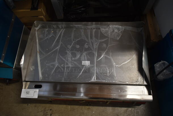 BRAND NEW SCRATCH AND DENT! Avantco 177EG30N Stainless Steel Commercial Electric Powered Flat Top Griddle. 208/240 Volts, 1 Phase.  - Image 3 of 5