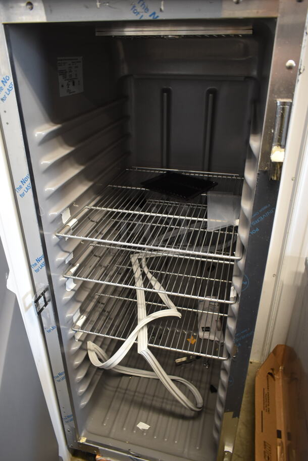 BRAND NEW SCRATCH AND DENT! 2023 Delfield 6025XL-S Stainless Steel Commercial Single Door Reach In Cooler w/ Poly Coated Racks. See Pictures For Damage. 115 Volts, 1 Phase. Tested and Powers On But Does Not Get Cold - Image 6 of 8