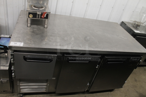 2014 Leader LB60 S/C Stainless Steel Commercial 3 Door Undercounter Cooler. 115 Volts, 1 Phase. Tested and Powers On But Does Not Get Cold