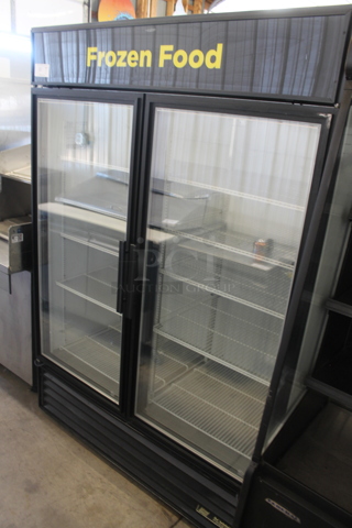 True GDM-49F-LD ENERGY STAR Metal Commercial 2 Door Reach In Freezer Merchandiser w/ Poly Coated Racks. 115/208-230 Volts, 1 Phase.