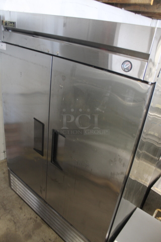 True T-49F ENERGY STAR Stainless Steel Commercial 2 Door Reach In Freezer on Commercial Casters. 115 Volts, 1 Phase. Tested and Powers On But Does Not Get Cold