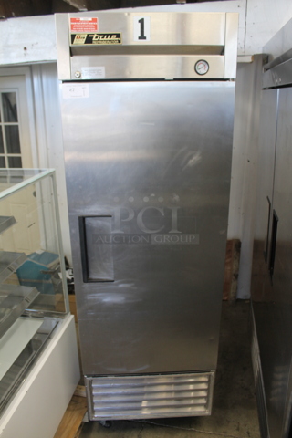 True T-23 Stainless Steel Commercial Single Door Reach In Cooler w/ Poly Coated Racks on Commercial Casters. 115 Volts, 1 Phase. Tested and Powers On But Does Not Get Cold