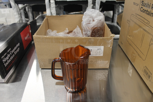Box of 4 BRAND NEW SCRATCH AND DENT! Choice 69032SANGD 32 oz. Amber SAN Plastic Beverage Pitcher - Image 2 of 5
