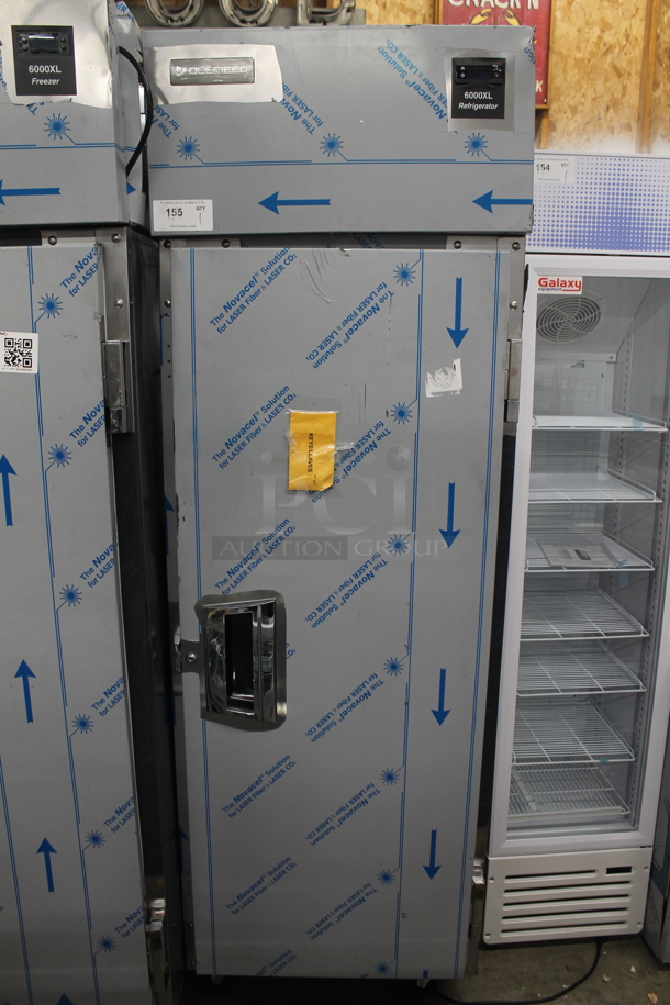 BRAND NEW SCRATCH AND DENT! 2023 Delfield 6025XL-S Stainless Steel Commercial Single Door Reach In Cooler w/ Poly Coated Racks. 115 Volts, 1 Phase. Tested and Does Not Power On - Image 2 of 7