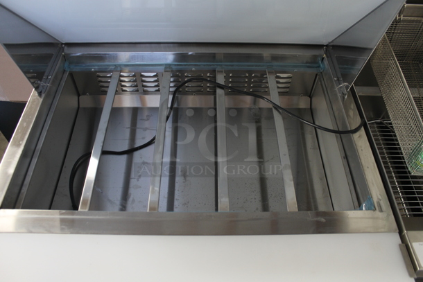 BRAND NEW SCRATCH AND DENT! 2023 Avantco 178SSPT36MHC Stainless Steel Commercial Sandwich Salad Prep Table Bain Marie Mega Top on Commercial Casters. 115 Volts, 1 Phase. Tested and Powers On But Does Not Get Cold - Image 5 of 8
