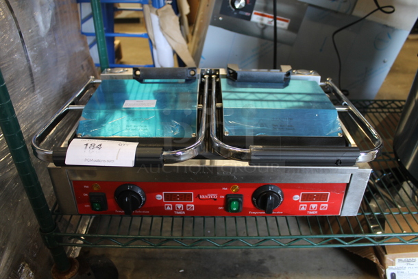 BRAND NEW SCRATCH AND DENT! Avantco PG400T 177PG4001 Commercial Dual Panini Sandwich Grill with Timer, Grooved Plates, and 19 5/8" x 9 1/8" Cooking Surface. 120 Volts, 1 Phase. Tested and Working! - Image 2 of 6