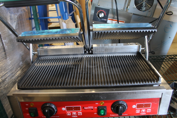 BRAND NEW SCRATCH AND DENT! Avantco PG400T 177PG4001 Commercial Dual Panini Sandwich Grill with Timer, Grooved Plates, and 19 5/8" x 9 1/8" Cooking Surface. 120 Volts, 1 Phase. Tested and Working! - Image 4 of 6