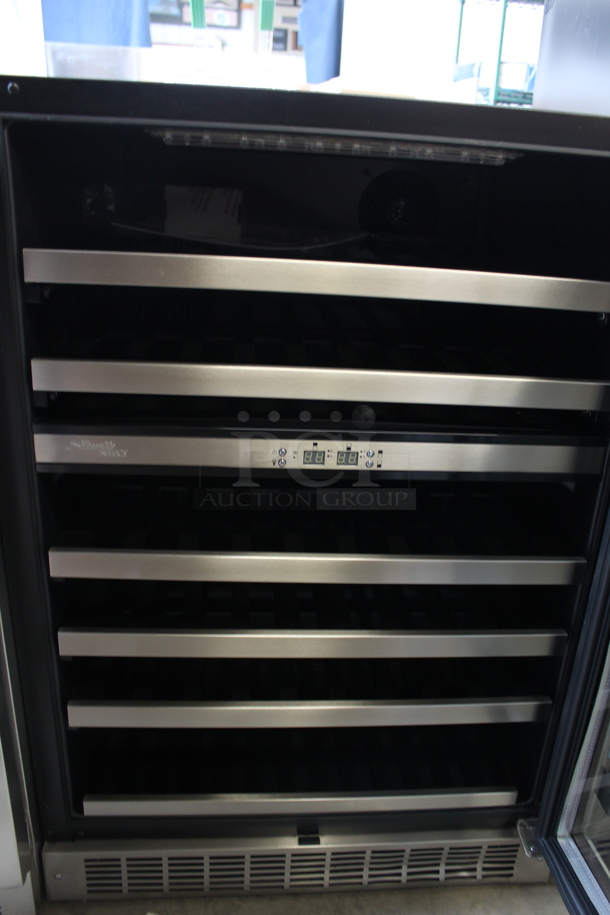 BRAND NEW SCRATCH AND DENT! Danby Silhouette Select Series DWC153BLSST
24 Inch Undercounter Dual Zone Wine Cooler with 51-Bottle Capacity, Roller Glide Wooden Shelves, Temperature Alarm, Digital Thermostat and LED Display. 115 Volts, 1 Phase. Tested and Working! - Image 2 of 3