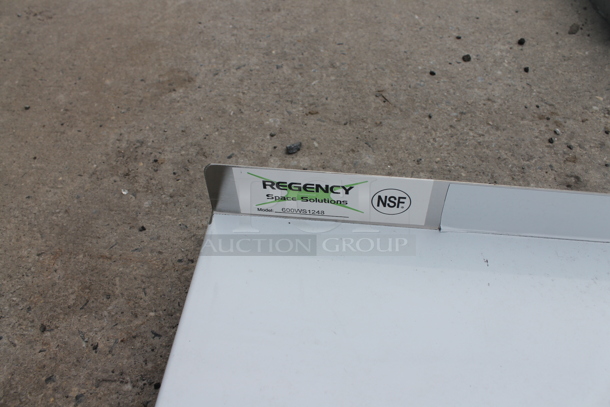 BRAND NEW SCRATCH AND DENT! Regency 600WS1248 18 Gauge Stainless Steel 12" x 48" Solid Wall Shelf - Image 4 of 6