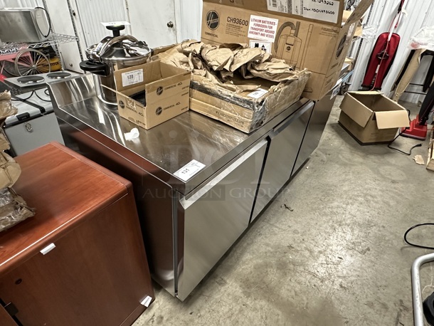BRAND NEW SCRATCH AND DENT! 2023 Avantco 178SSWT72RHC SS-WT-72R-HC Stainless Steel Commercial 72" Three Door Worktop Refrigerator with 3 1/2" Backsplash on Commercial Casters. 115 Volts, 1 Phase. Tested and Working! - Image 5 of 10