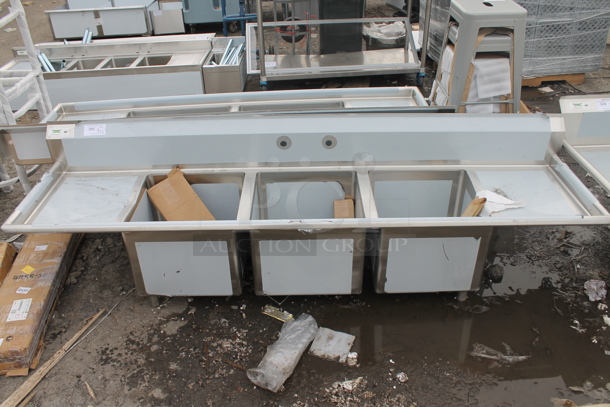 BRAND NEW SCRATCH AND DENT! Regency 600S31818218 Regency 16 Gauge Stainless Steel Three Compartment Commercial Sink with Cross Bracing and Two Drainboards - 18" x 18" x 14" Bowls - Image 2 of 7