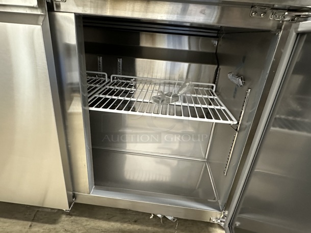 BRAND NEW SCRATCH AND DENT! 2023 Avantco 178SSWT72RHC SS-WT-72R-HC Stainless Steel Commercial 72" Three Door Worktop Refrigerator with 3 1/2" Backsplash on Commercial Casters. 115 Volts, 1 Phase. Tested and Working! - Image 9 of 10