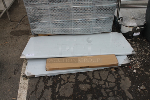 BRAND NEW SCRATCH AND DENT! Stainless Steel Table w/ Under Shelf and Legs.