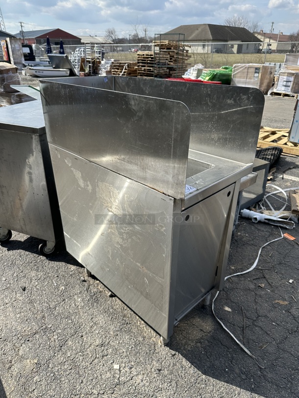 Stainless Steel Commercial Single Bay Sink w/ Faucet, Handles and Side Splash Guards.  - Image 2 of 5