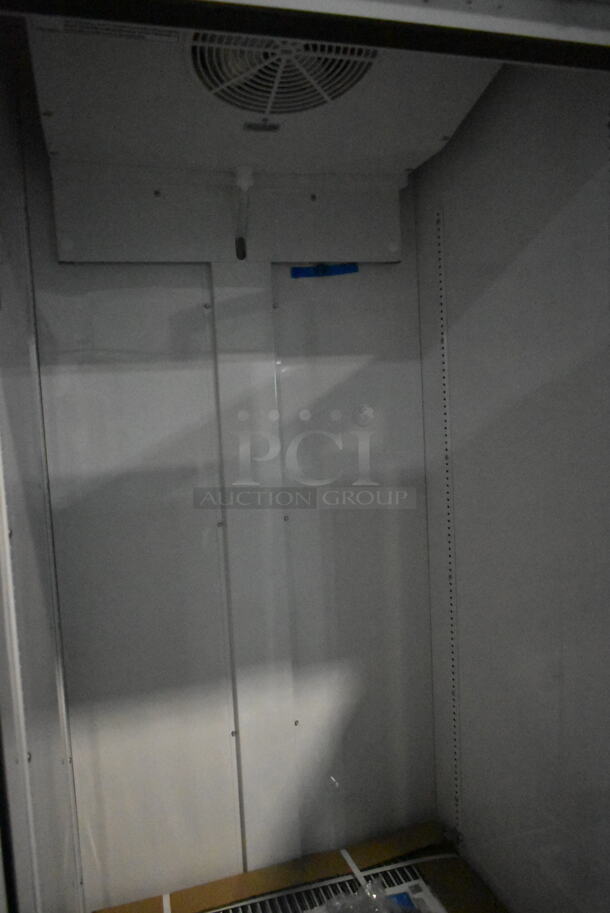 BRAND NEW SCRATCH AND DENT! 2023 True TSCI-600R-G-PH Metal Commercial Single Door Reach In Cooler Merchandiser w/ Commercial Casters. 115 Volts, 1 Phase. Tested and Working! - Image 5 of 6