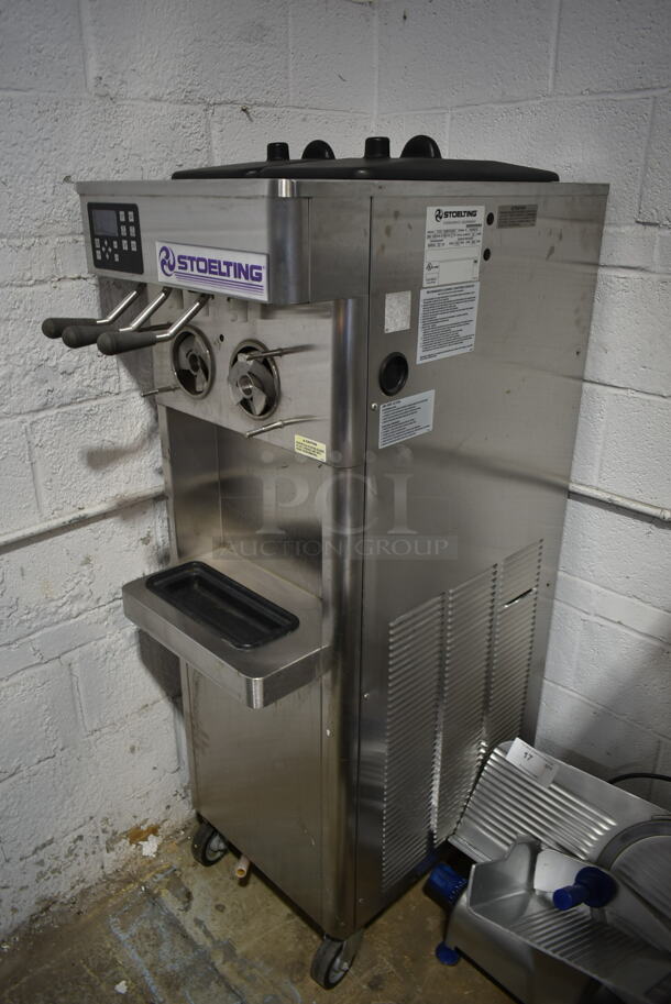	2014 Stoelting F231-109I2YGAD1 Stainless Steel Commercial Floor Style Water Cooled 2 Flavor w/ Twist Soft Serve Ice Cream Machine on Commercial Casters. 208-240 Volts, 3 Phase. - Image 2 of 7