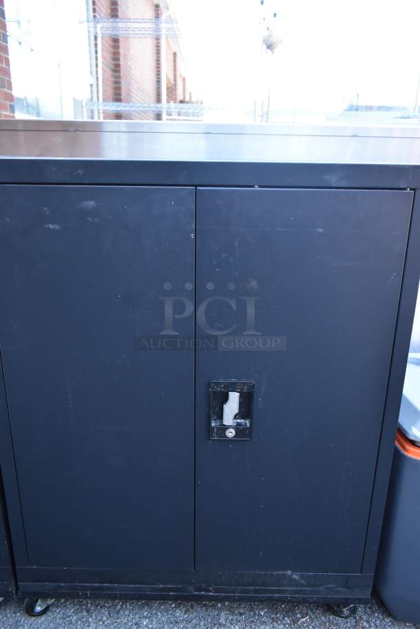 Black Metal 2 Door Cabinet w/ Contents on Commercial Casters.  - Image 2 of 4