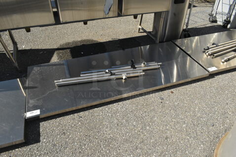Stainless Steel Tabletop w/ Metal Legs.
