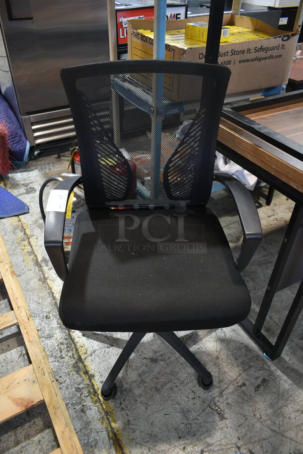 Black Office Chair w/ Arm Rests on Casters.  - Image 1 of 5