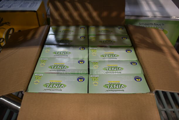 3 Boxes of 10 BRAND NEW! SmoothTouch Vinyl Gloves; 1 X Large and 2 Large. 3 Times Your Bid! - Image 1 of 5