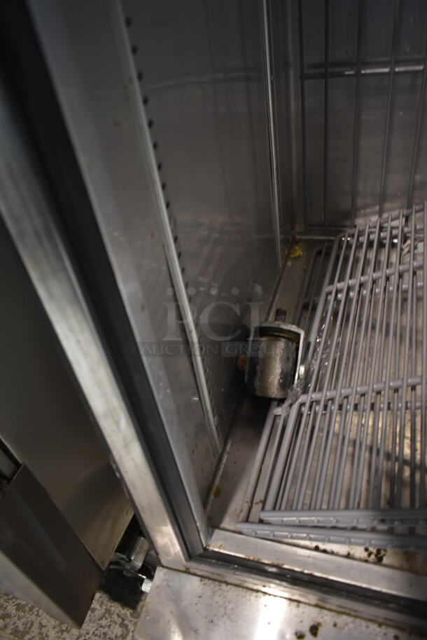 2017 True T-19F Stainless Steel Commercial Single Door Reach In Freezer w/ Poly Coated Racks on Commercial Casters. 115 Volts, 1 Phase. Cannot Test - Unit Trips Breaker - Image 6 of 7