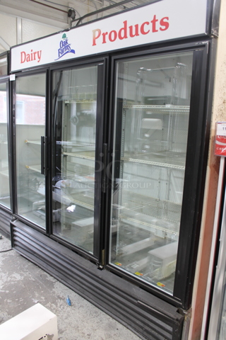 True GDM-72 Metal Commercial 3 Door Reach In Cooler Merchandiser w/ Poly Coated Racks. 115 Volts, 1 Phase. Tested and Powers On But Does Not Get Cold