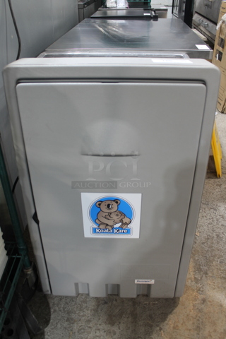 Koala Kare Poly Gray Wall Mount Diaper Changing Station. 