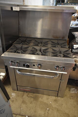 Southbend S36D Stainless Steel Natural Gas Powered 6 Burner Range w/ Oven, Over Shelf and Back Splash. 