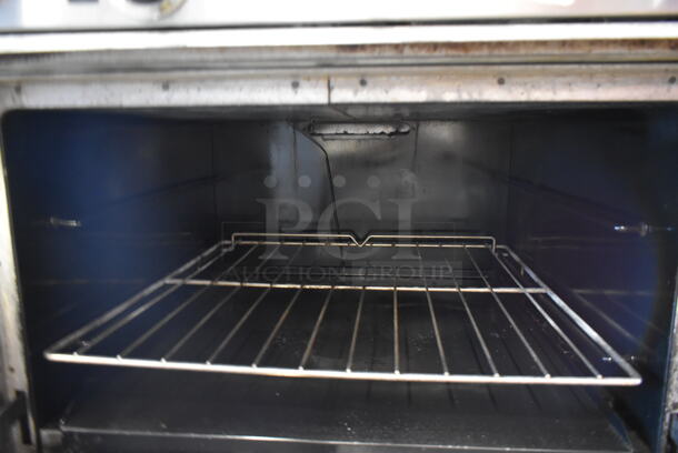 Southbend S36D Stainless Steel Natural Gas Powered 6 Burner Range w/ Oven, Over Shelf and Back Splash.  - Image 4 of 7