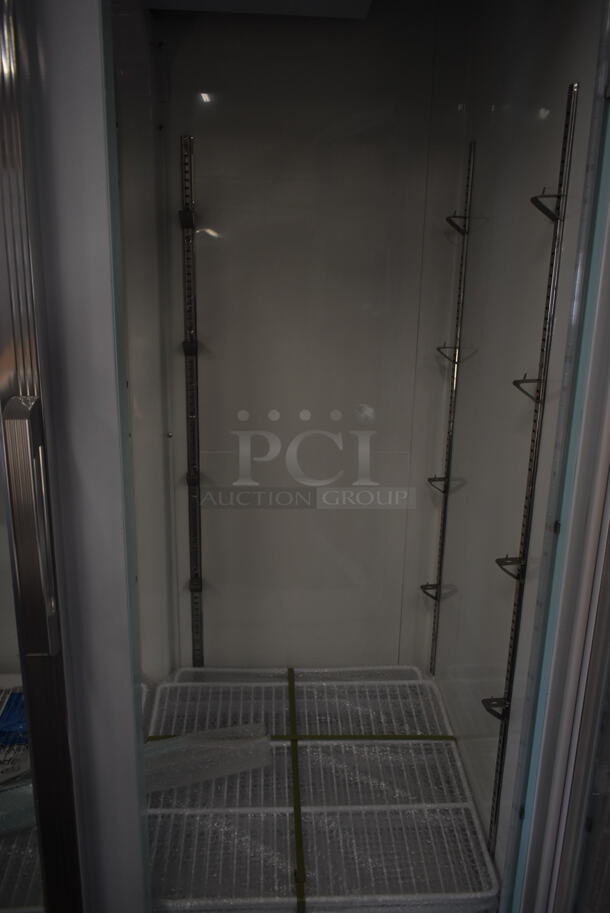 BRAND NEW SCRATCH AND DENT! 2023 Avantco 178GDC40HCW 48" White Swing Glass Door Merchandiser Refrigerator with LED Lighting. See Pictures For Damage. 115 Volts, 1 Phase. Tested and Working! - Image 7 of 8