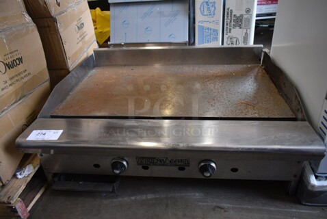 American Range Stainless Steel Commercial Countertop Natural Gas Powered Flat Top Griddle. 