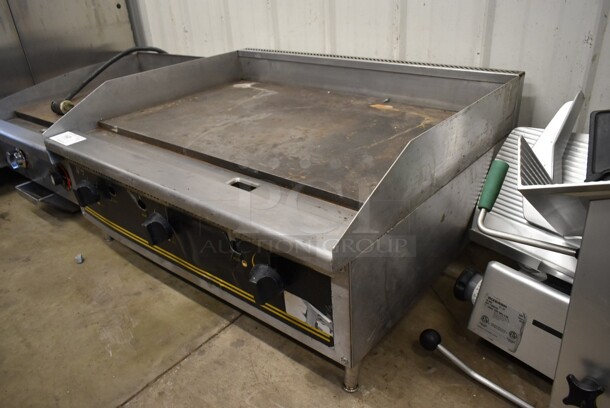Stainless Steel Commercial Countertop Natural Gas Powered Flat Top Griddle.  - Image 2 of 4
