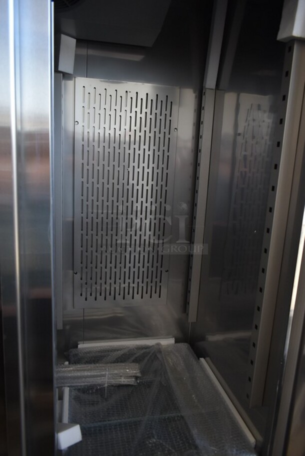 BRAND NEW SCRATCH AND DENT! Avantco 178SS2RHC Stainless Steel Commercial 2 Door Reach In Cooler w/ Poly Coated Racks on Commercial Casters. 115 Volts, 1 Phase. Tested and Working! - Image 5 of 7