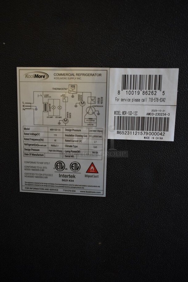 BRAND NEW SCRATCH AND DENT! KoolMore MDR-1GD-12C Metal Commercial Single Door Reach In Cooler Merchandiser w/ Poly Coated Racks. 115 Volts, 1 Phase. Tested and Working! - Image 7 of 7