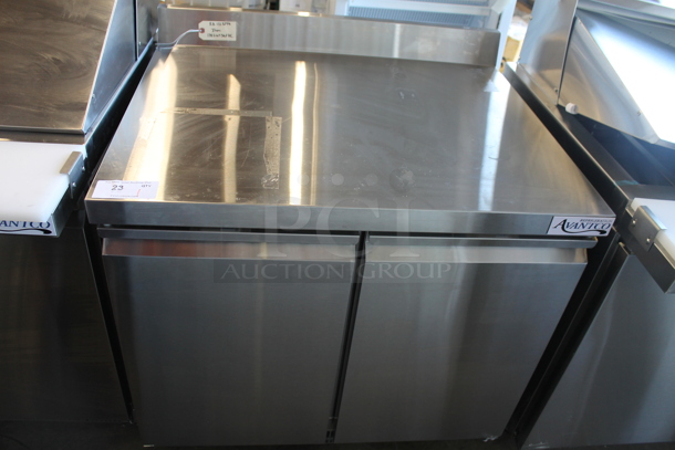BRAND NEW SCRATCH AND DENT! 2023 Avantco 178ZWT36FHC Stainless Steel Commercial 2 Door Work Top Freezer w/ Back Splash. 115 Volts, 1 Phase. Tested and Working! - Image 2 of 6