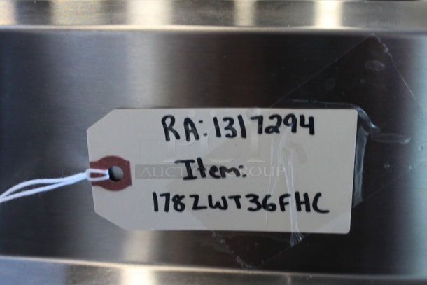BRAND NEW SCRATCH AND DENT! 2023 Avantco 178ZWT36FHC Stainless Steel Commercial 2 Door Work Top Freezer w/ Back Splash. 115 Volts, 1 Phase. Tested and Working! - Image 6 of 6