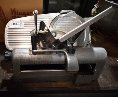 Hobart 1612 Stainless Steel Commercial Countertop Automatic Meat Slicer. 115 Volts, 1 Phase. Cannot Test - Unit Trips Breaker