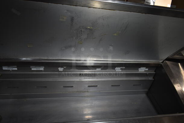 2016 Traulsen T5048HT Stainless Steel Commercial Pizza Prep Table on Commercial Casters. 115 Volts, 1 Phase. Tested and Powers On But Does Not Get Cold
 - Image 3 of 9