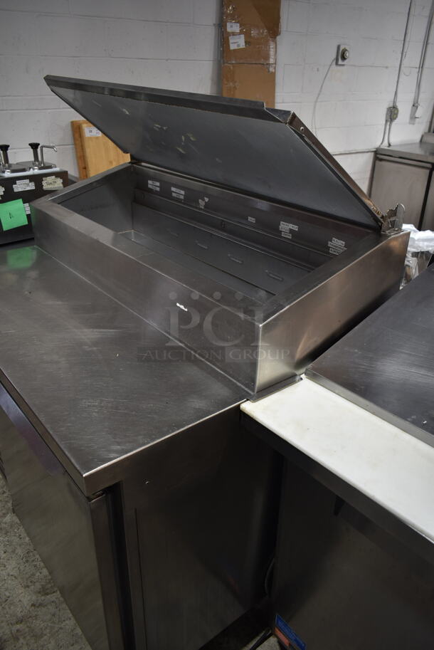 2016 Traulsen T5048HT Stainless Steel Commercial Pizza Prep Table on Commercial Casters. 115 Volts, 1 Phase. Tested and Powers On But Does Not Get Cold
 - Image 4 of 9