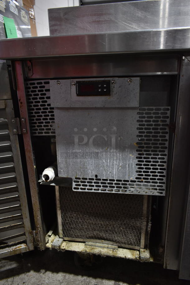 2016 Traulsen T5048HT Stainless Steel Commercial Pizza Prep Table on Commercial Casters. 115 Volts, 1 Phase. Tested and Powers On But Does Not Get Cold
 - Image 8 of 9