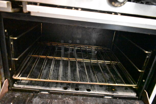 Garland SunFire S-10-2626 Stainless Steel Commercial Propane Gas Powered 10 Burner Range w/ 2 Ovens, Back Splash and Over Shelf.  - Image 5 of 7