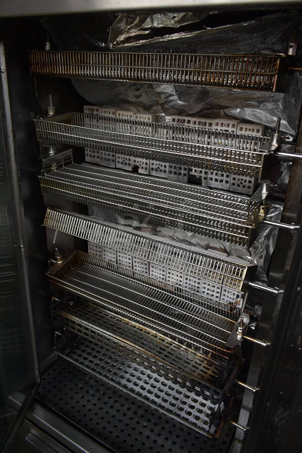 Stainless Steel Commercial Floor Style Natural Gas Powered 7 Spit Rotisserie Oven on Commercial Casters.  - Image 6 of 9