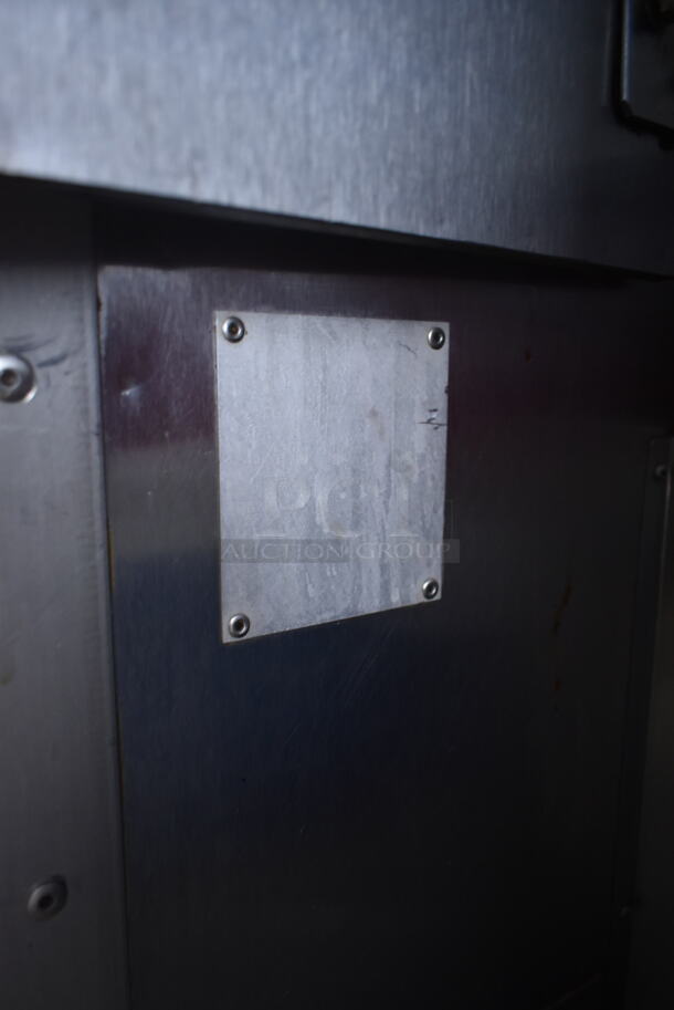 Stainless Steel Commercial Floor Style Natural Gas Powered 7 Spit Rotisserie Oven on Commercial Casters.  - Image 9 of 9