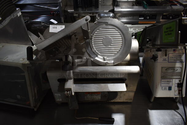 Globe 3750 Stainless Steel Commercial Countertop Automatic Meat Slicer w/ Blade Sharpener. 115 Volts, 1 Phase. Tested and Powers On But Parts Do Not Move - Image 1 of 8