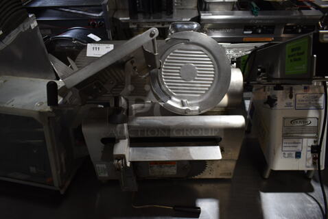 Globe 3750 Stainless Steel Commercial Countertop Automatic Meat Slicer w/ Blade Sharpener. 115 Volts, 1 Phase. Tested and Powers On But Parts Do Not Move