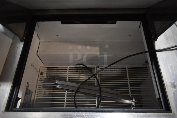 True TSSU-36-12M-B Stainless Steel Commercial Sandwich Salad Prep Table Bain Marie Mega Top on Commercial Casters. 115 Volts, 1 Phase. Tested and Powers On But Does Not Get Cold - Image 5 of 8