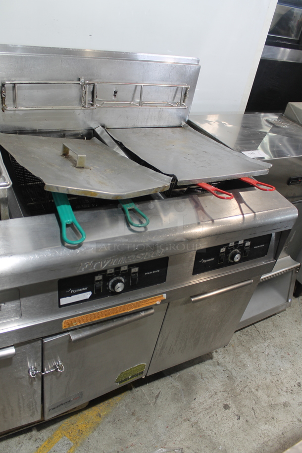 Frymaster FMPH250SC Stainless Steel Commercial Natural Gas Powered 2 Bay Fryer w/ Left Side Dumping Station, 4 Metal Fry Baskets and 3 Lids on Commercial Casters. 80,000 BTU.  - Image 3 of 11